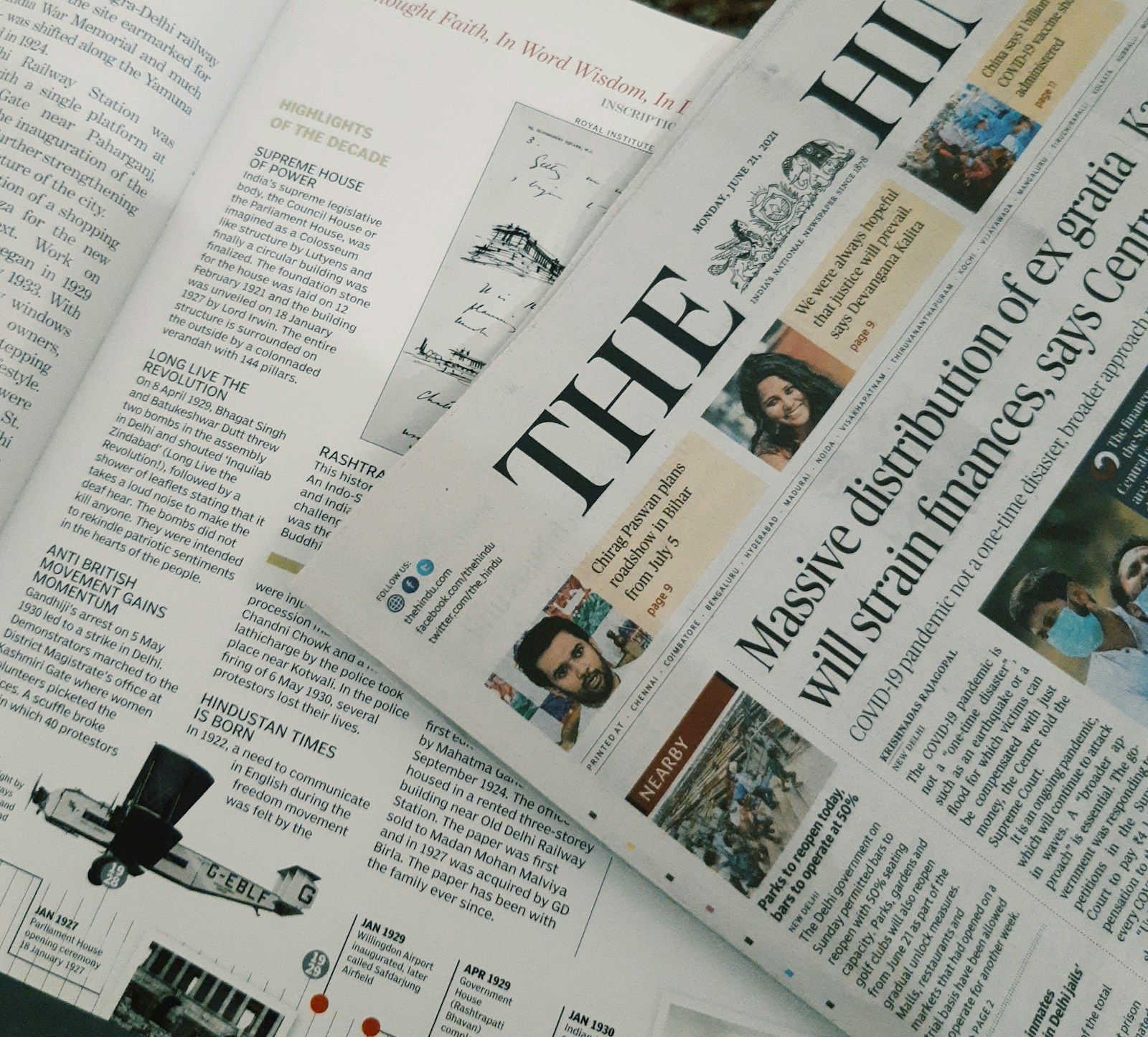 A newspaper page with dense printed text, photographed by Ashni on Unsplash.